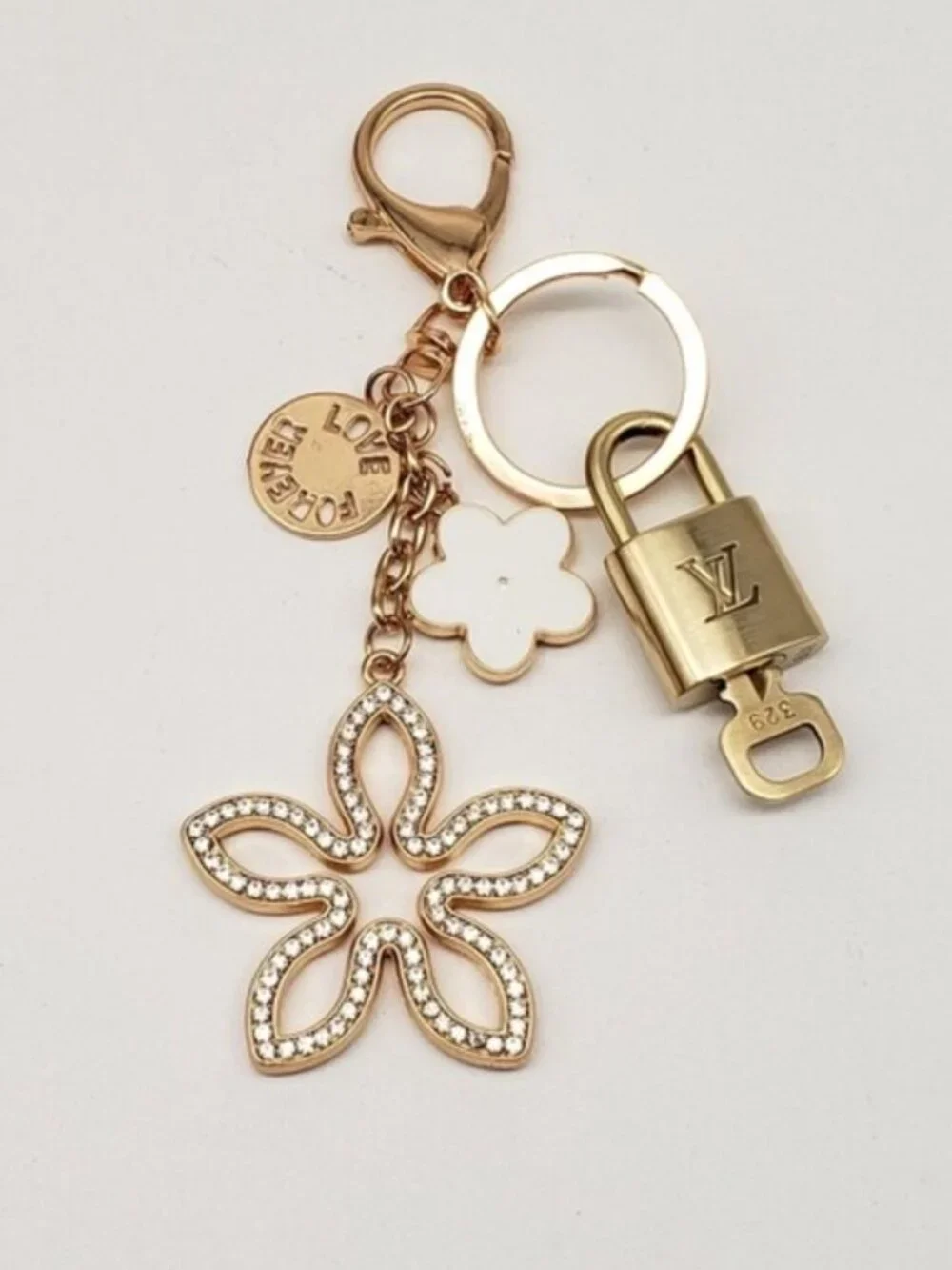 Authentic Louis Vuitton Gold Lock & Key 🔑 Bag Charm w/ Unbranded Clover Charm